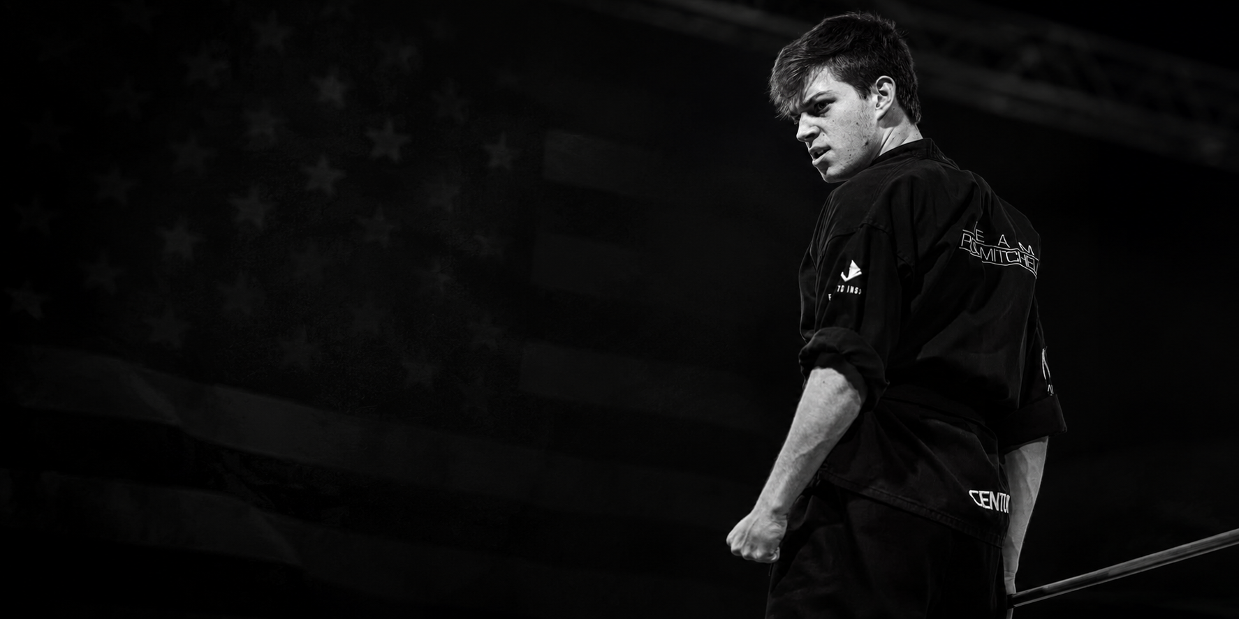 Karateka aiming karate gi with shattering tournament point